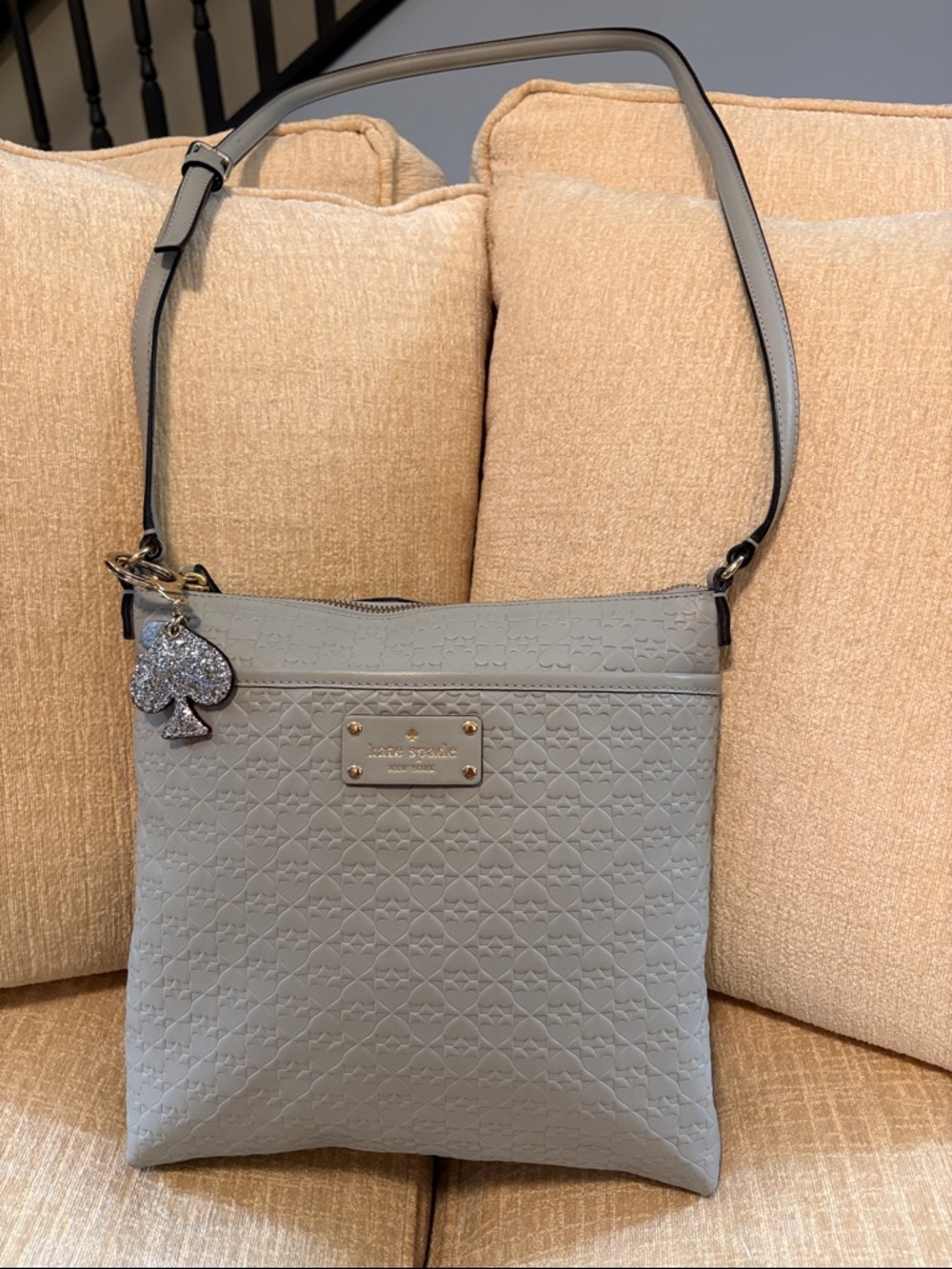 kate spade Embossed Light Gray Crossbody Bag with Spade Charm